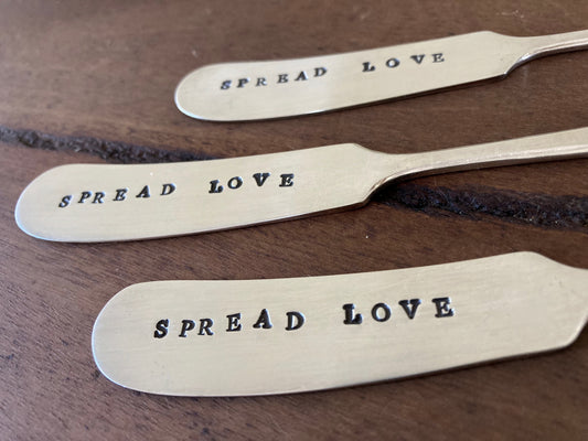 Spread Love letter-stamped knife