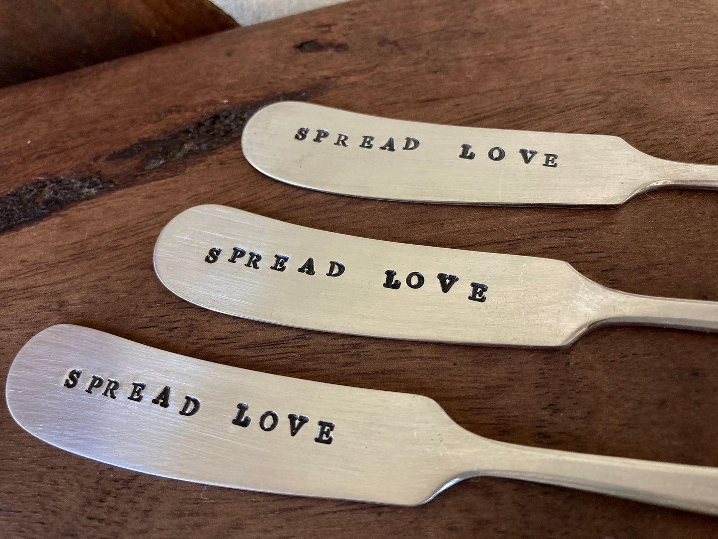 Spread Love letter-stamped knife